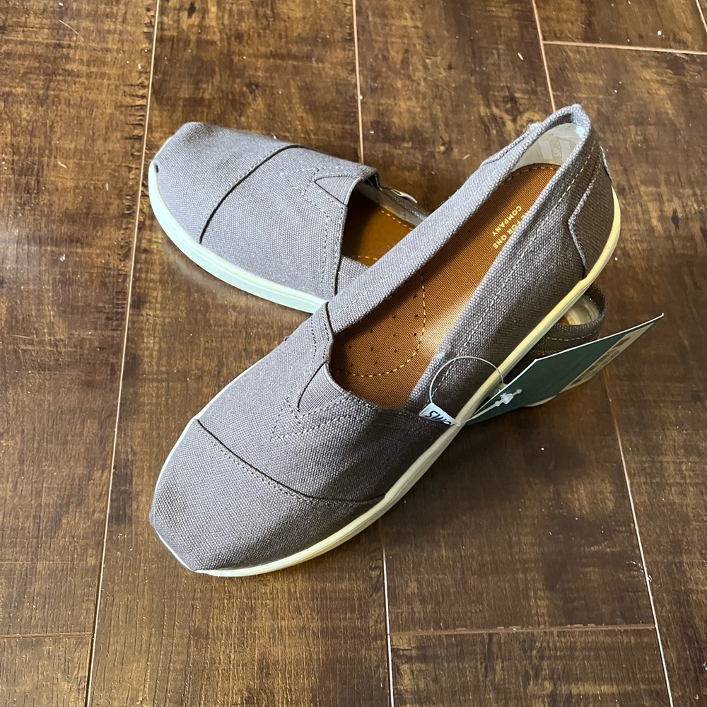 TOMS canvas shoes.